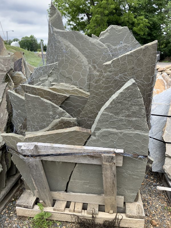 IRREGULAR FLAGSTONE - PA BLUE Standup Flagging 1 1/2″ to 2 1/2″ thickness 3 to 9 sq ft per piece 1,900 to 2,100 lbs per pallet Coverage – 70 to 85 sq ft per ton *Additional Colors Available *Available for pickup and we will load on your truck or trailer.  For Delivery options please contact up for information and pricing.