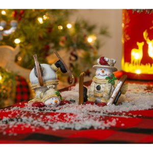 Snowman on Skis Table Décor sold separately. This one has fallen headfirst. Buy now online or visit Elkin Lawn and Garden - Christmas Store.